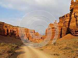 Road in red Canyon Charyn (Sharyn) at sunset